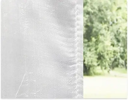 Foto von grauer Halbtransparenter Gardine